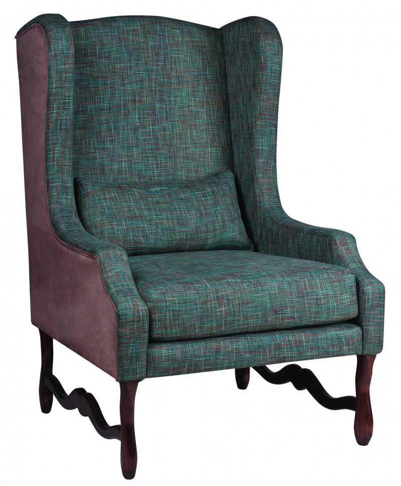 Cadeira de aproximação Diamond e Prado, com tons sóbrios e tecidos quentes