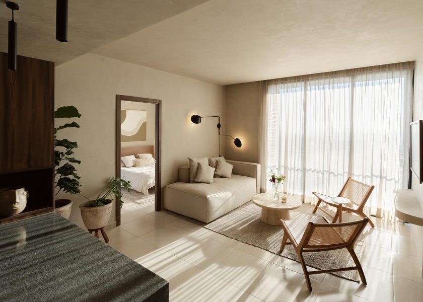 A luminária de parede orienta a cena e cria uma luz suave, associada à luz natural deixando a sala mais acolhedora e controlada. Projeto Dinamita Taller | Foto Bruno Rezza.