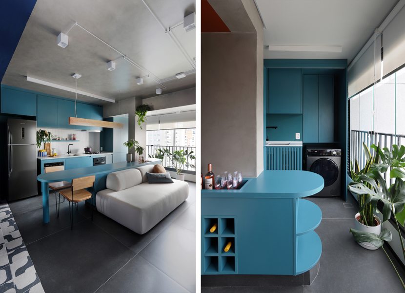 Móveis multifuncionais: Projetado na altura de uma mesa, o balcão azul cumpre o papel de divisória e apoio— design que se adapta ao dia a dia. Móveis longitudinais: O mesmo balcão percorre toda a divisão entre a sala e a cozinha até chegar à varanda unindo-se à lavanderia.  