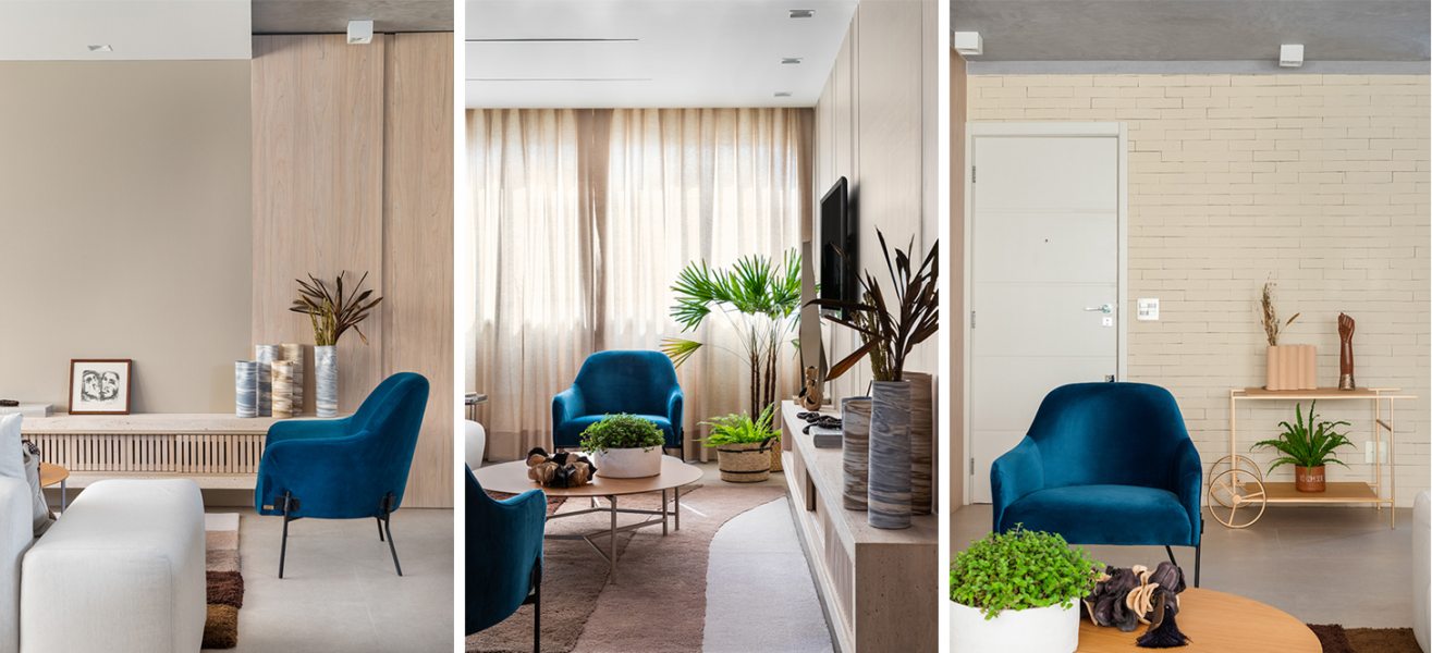 A vegetação e as poltronas em azul royal são os únicos pontos de cor no apartamento