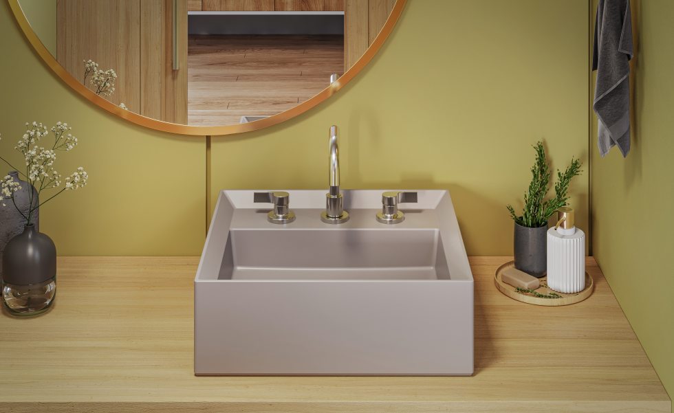 Acima: A cuba de apoio Stone, da linha Platinum, reforça a modernidade das linhas geométricas para um banheiro atemporal | Foto: Divulgação Incepa
